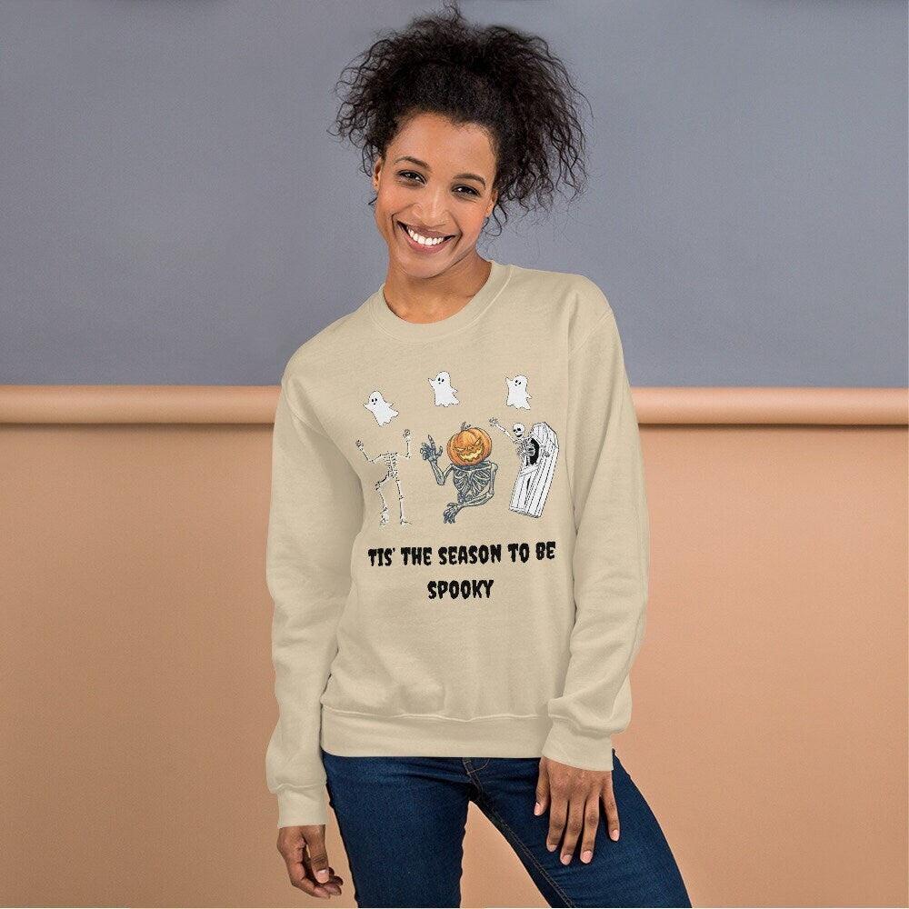 Tis The Season To Be Spooky Halloween Unisex Sweatshirt with Ghosts and Skeletons Great Gift for a Halloween Party Ugly Halloween Sweatshirt